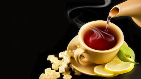 Чай, чашка, листья чая, стебель, лимон, печенье, черный фон, листья