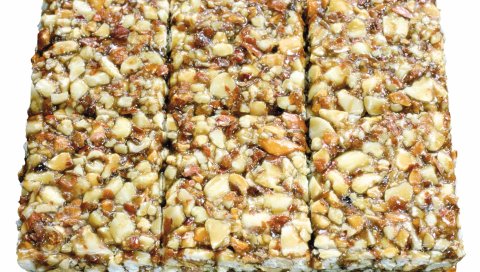 козинаки , семена, белый фон
