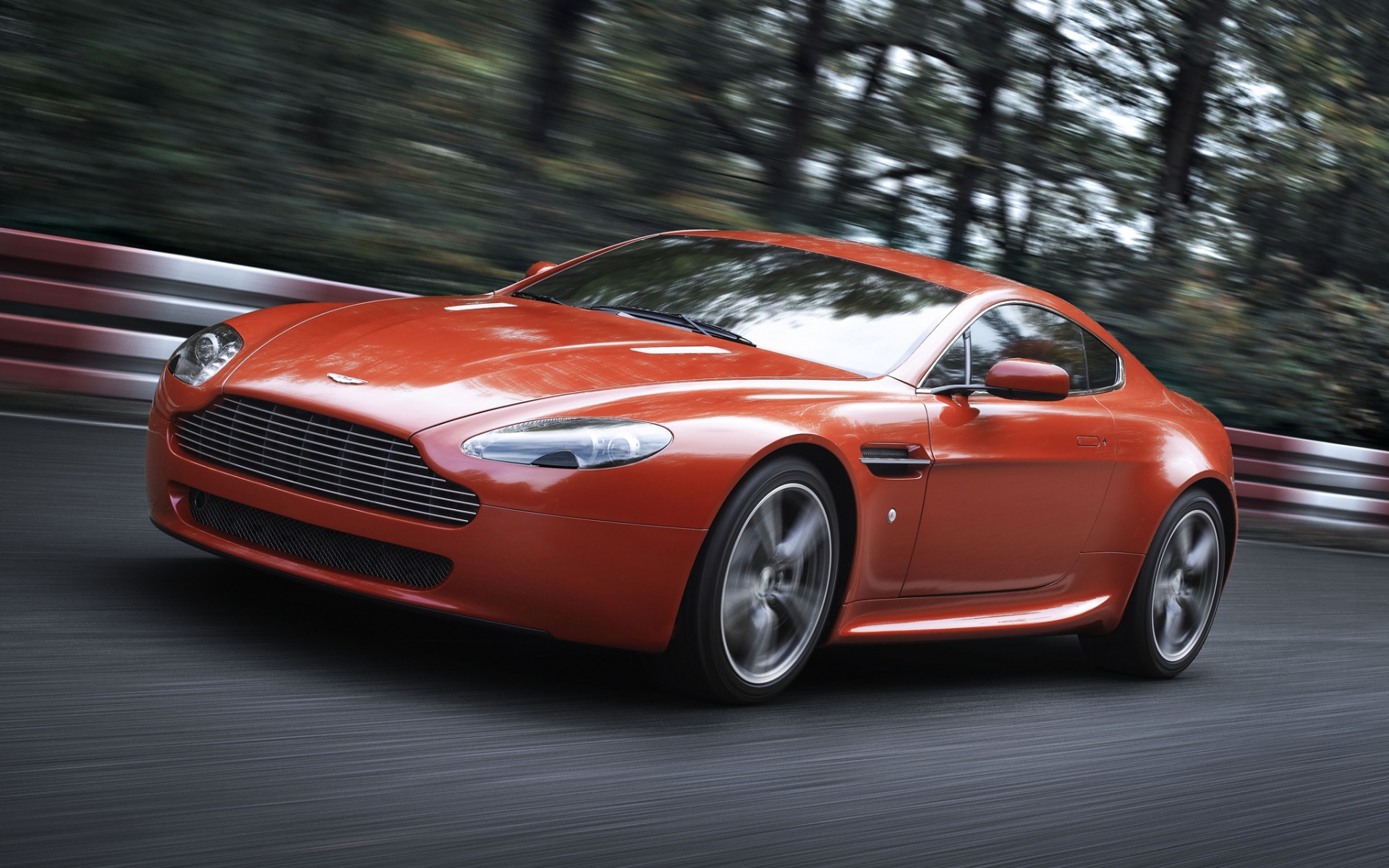 Картинки Aston martin v8 vantage, 2008, красный, вид спереди, скорость, деревья фото и обои на рабочий стол