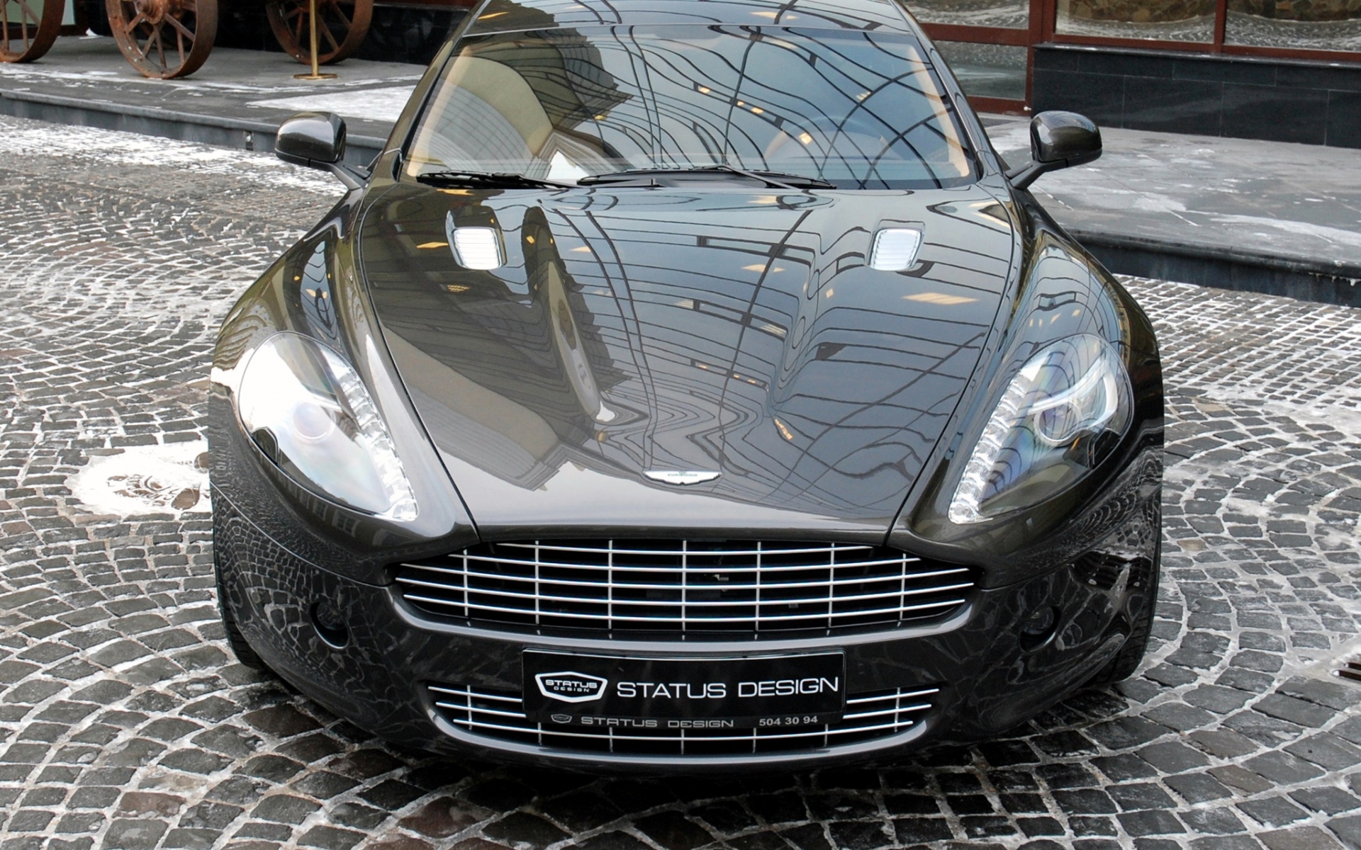 Картинки Aston martin, rapide, 2011, черный, вид спереди, улица фото и обои на рабочий стол