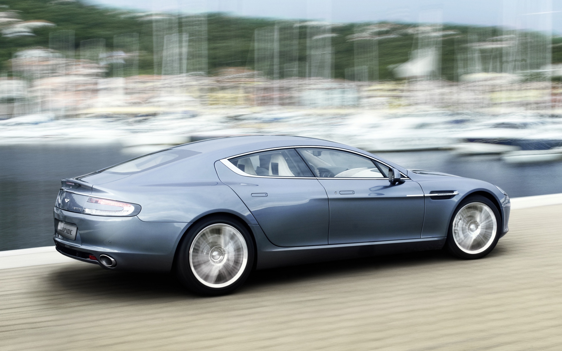 Картинки Aston martin, rapide, 2009, синий, вид сбоку, стиль, скорость фото и обои на рабочий стол