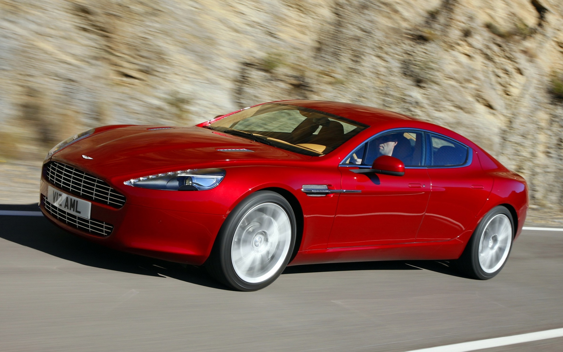 Картинки Aston martin, rapide, 2009, красный, вид сбоку, скорость, асфальт фото и обои на рабочий стол