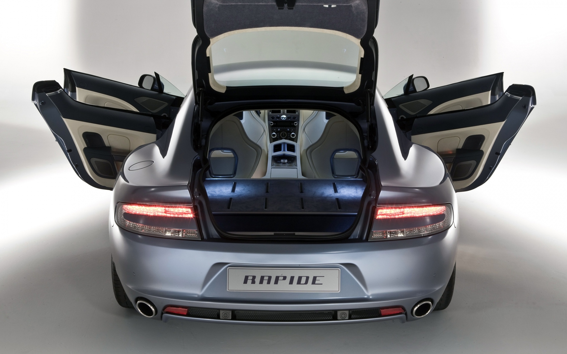 Картинки Aston martin, rapide, 2009, серый, вид сзади, стиль, авто фото и обои на рабочий стол