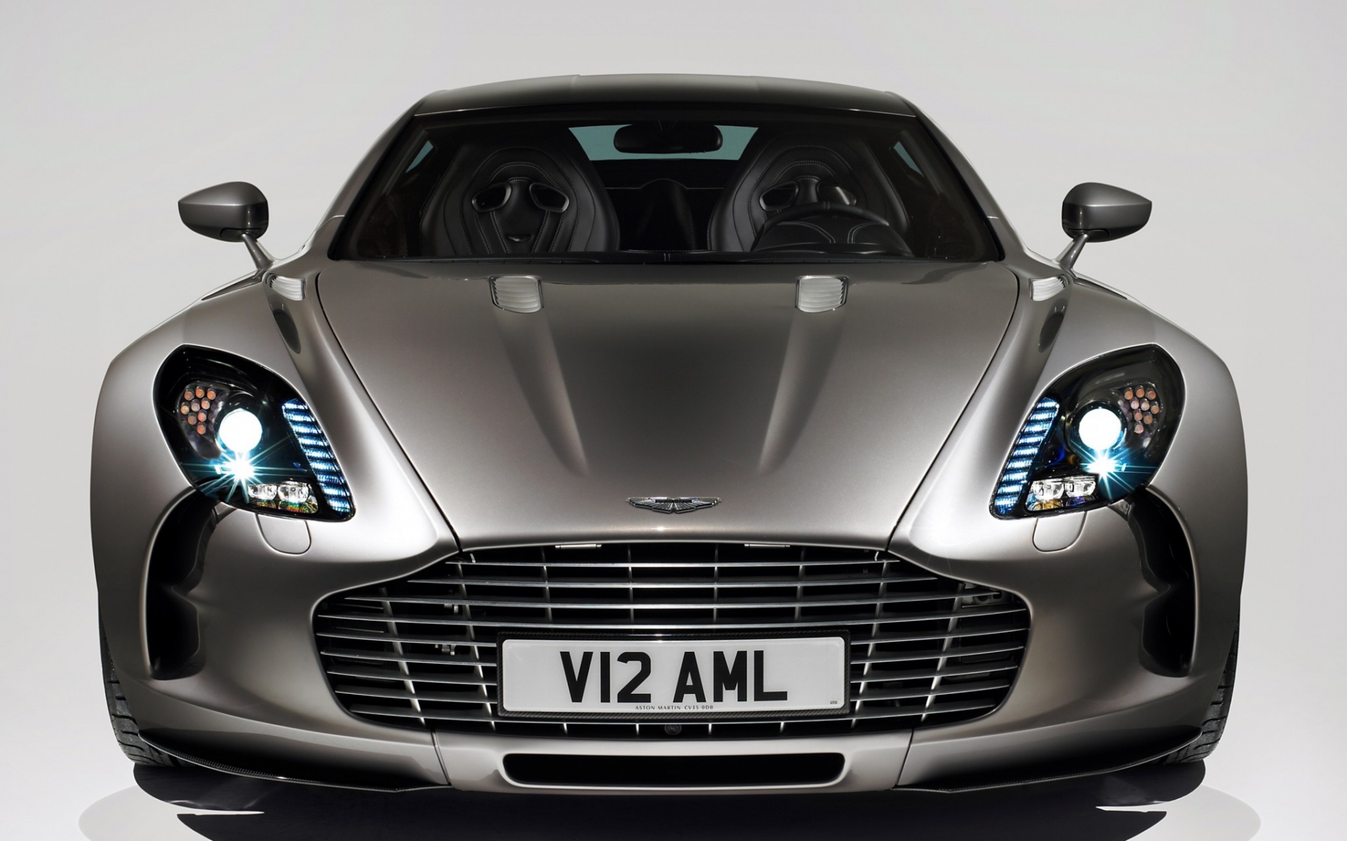 Картинки Aston martin, one-77, 2009, серый металлик, вид спереди, авто фото и обои на рабочий стол