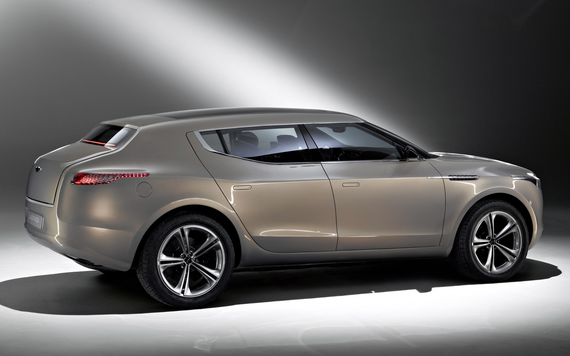 Картинки Aston martin, lagonda, 2009, концепт-кар, бежевый металлик, вид сбоку, авто фото и обои на рабочий стол