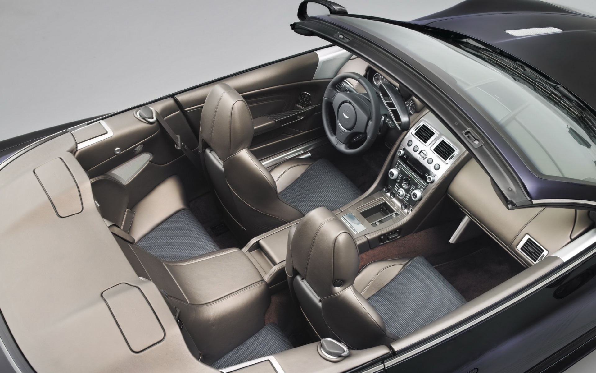 Картинки Aston martin, dbs, 2010, серый, салон, интерьер, вид сверху, руль, спидометр фото и обои на рабочий стол