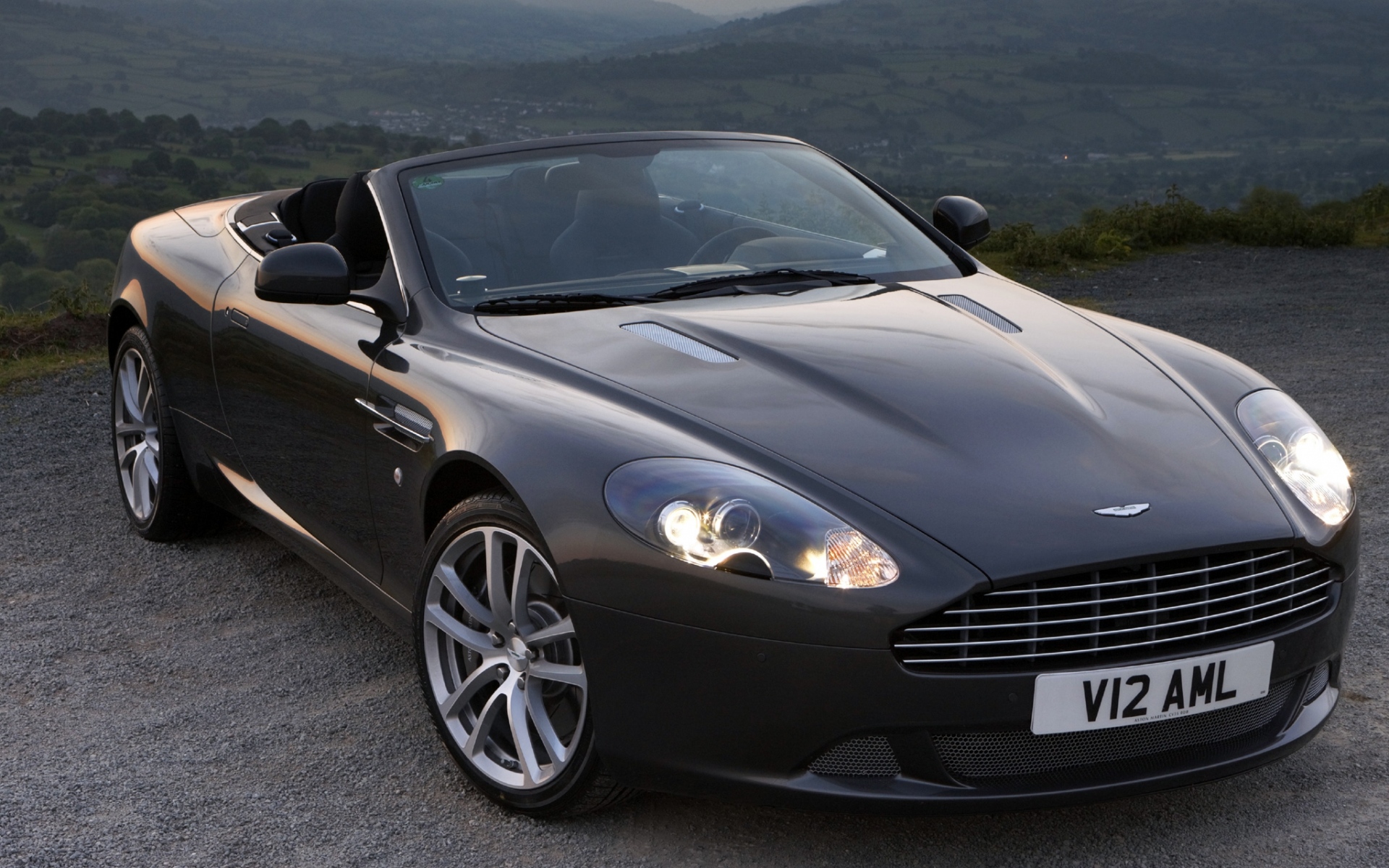 Картинки Aston martin, db9, 2010, черный, вид спереди, стиль, автомобили, горы фото и обои на рабочий стол