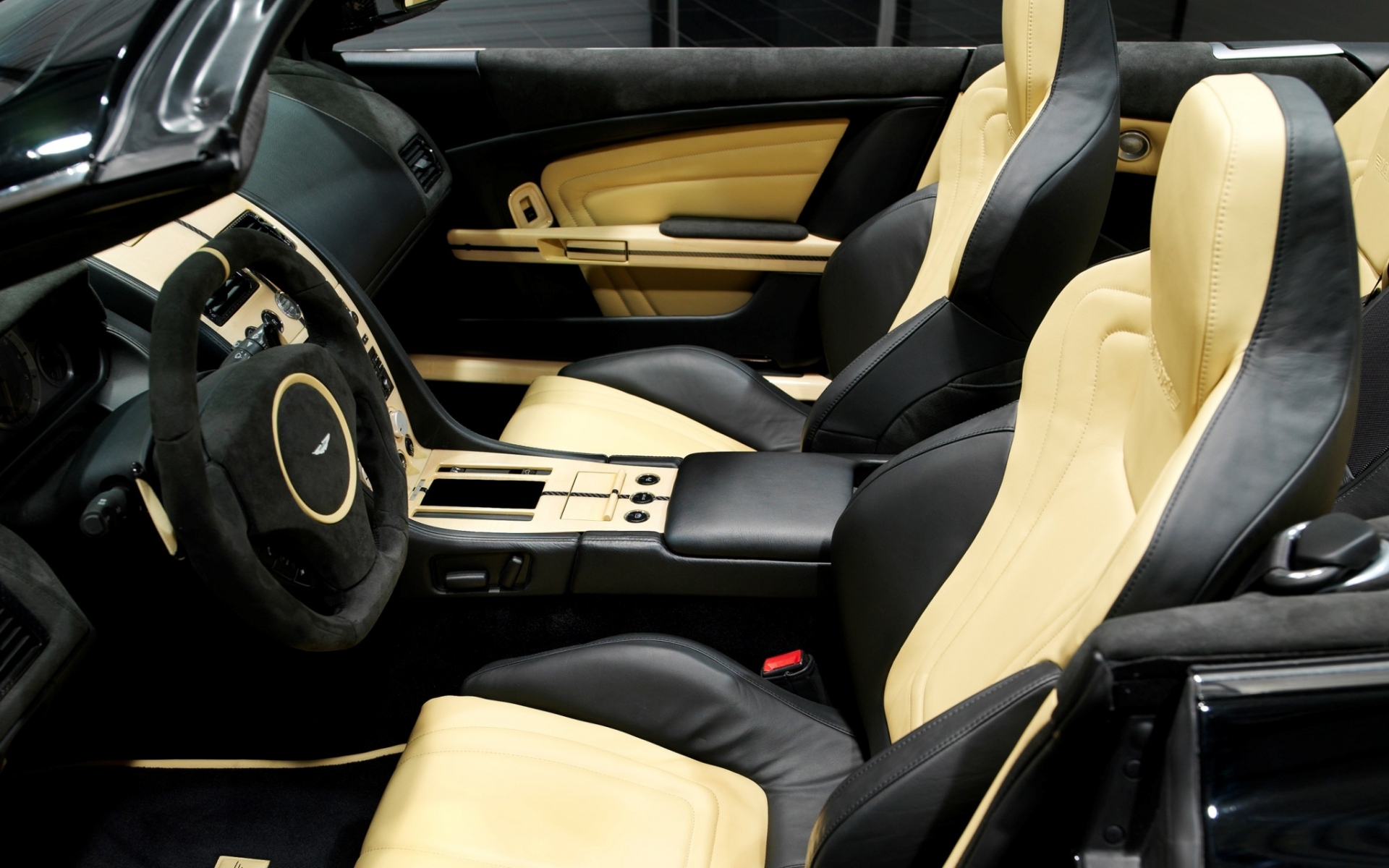 Картинки Mansory, aston martin, db9, 2008, интерьер, салон руля фото и обои на рабочий стол