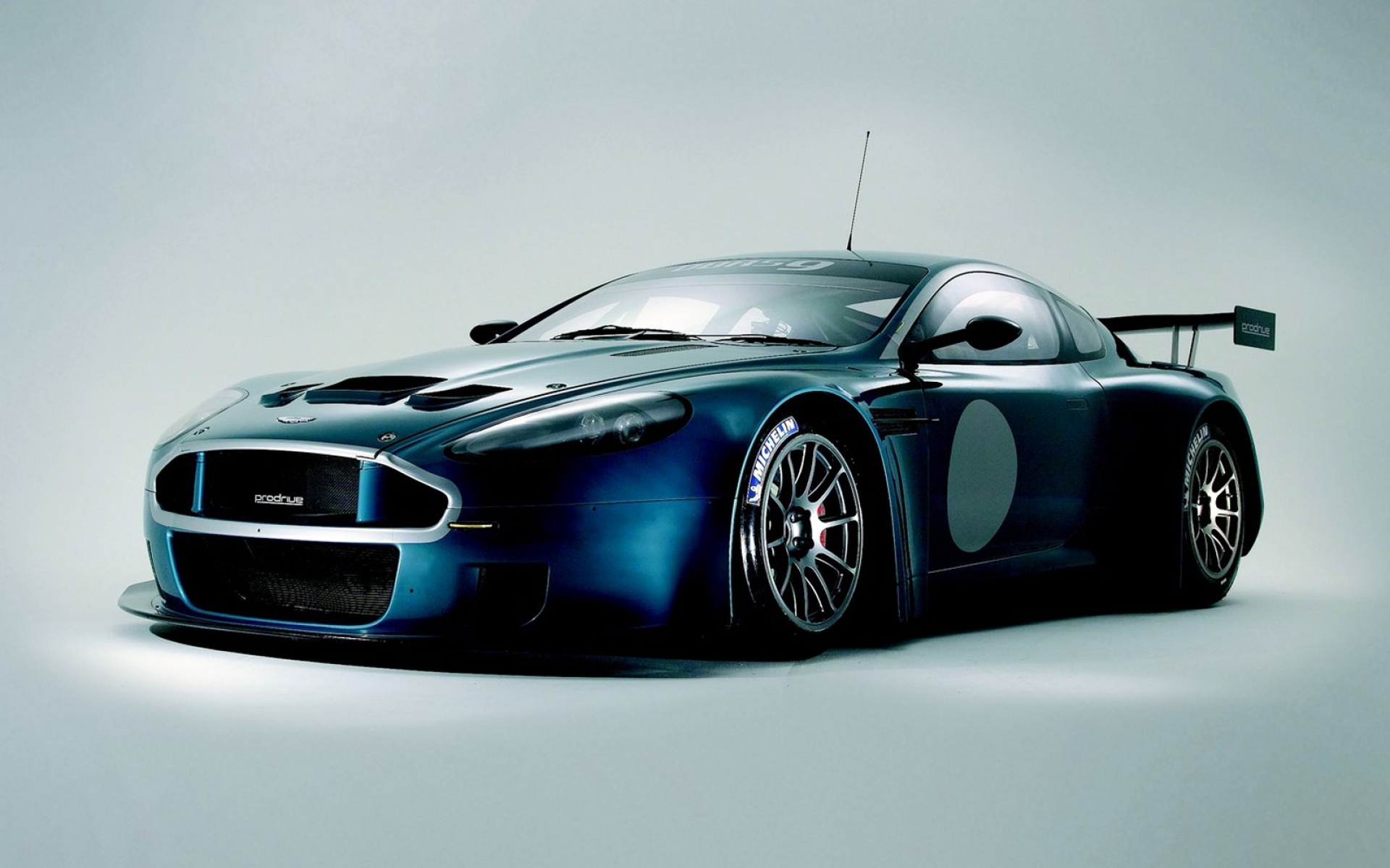 Картинки Aston martin, dbrs9, 2005, синий, вид спереди, стиль, спорт, авто фото и обои на рабочий стол