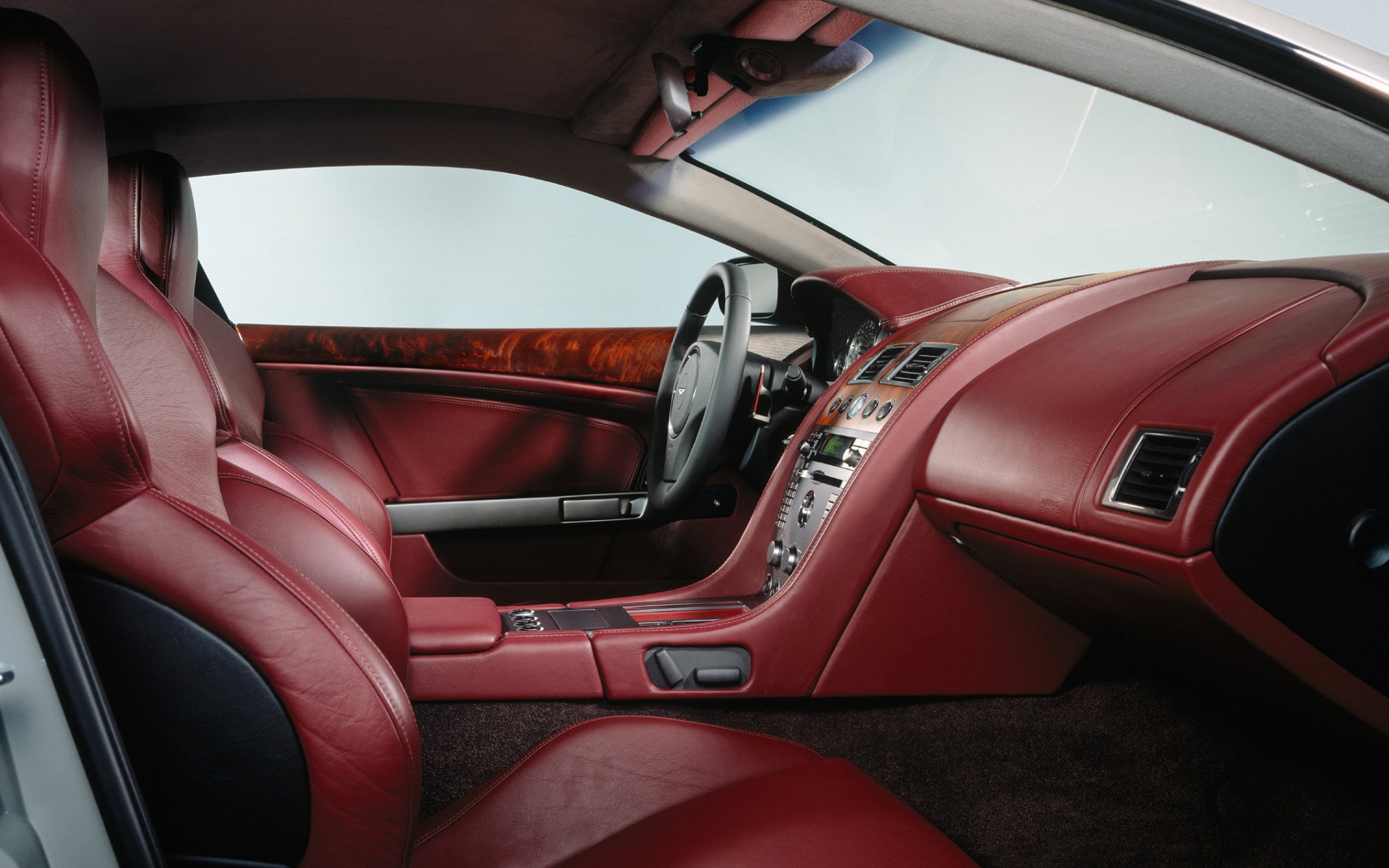 Картинки Aston martin, db9, 2004, красный, салон, салон, руль фото и обои на рабочий стол