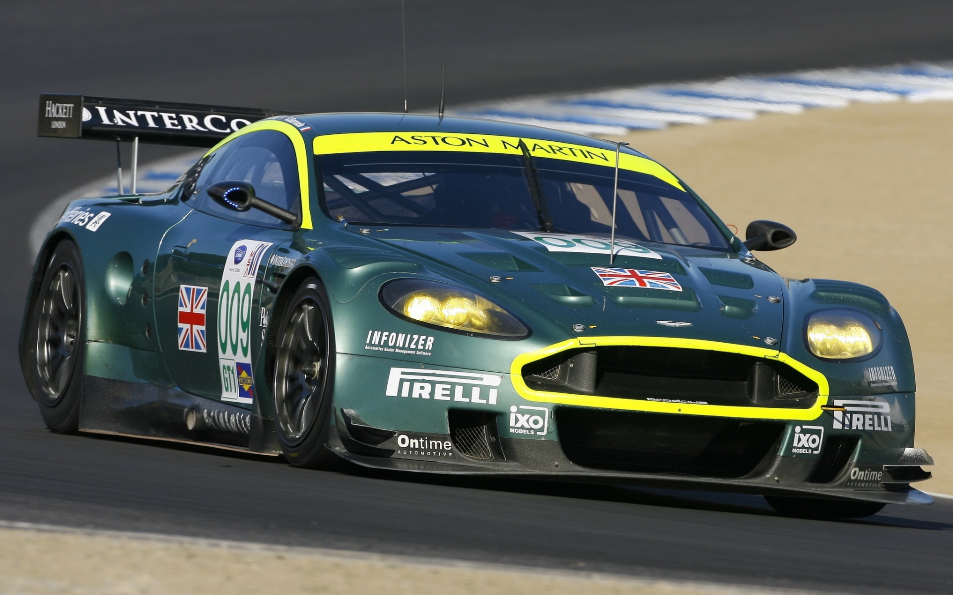 Картинки Aston martin, dbr9, 2007, зеленый, вид спереди, стиль, спорт, автомобиль, гоночный автомобиль, асфальт фото и обои на рабочий стол