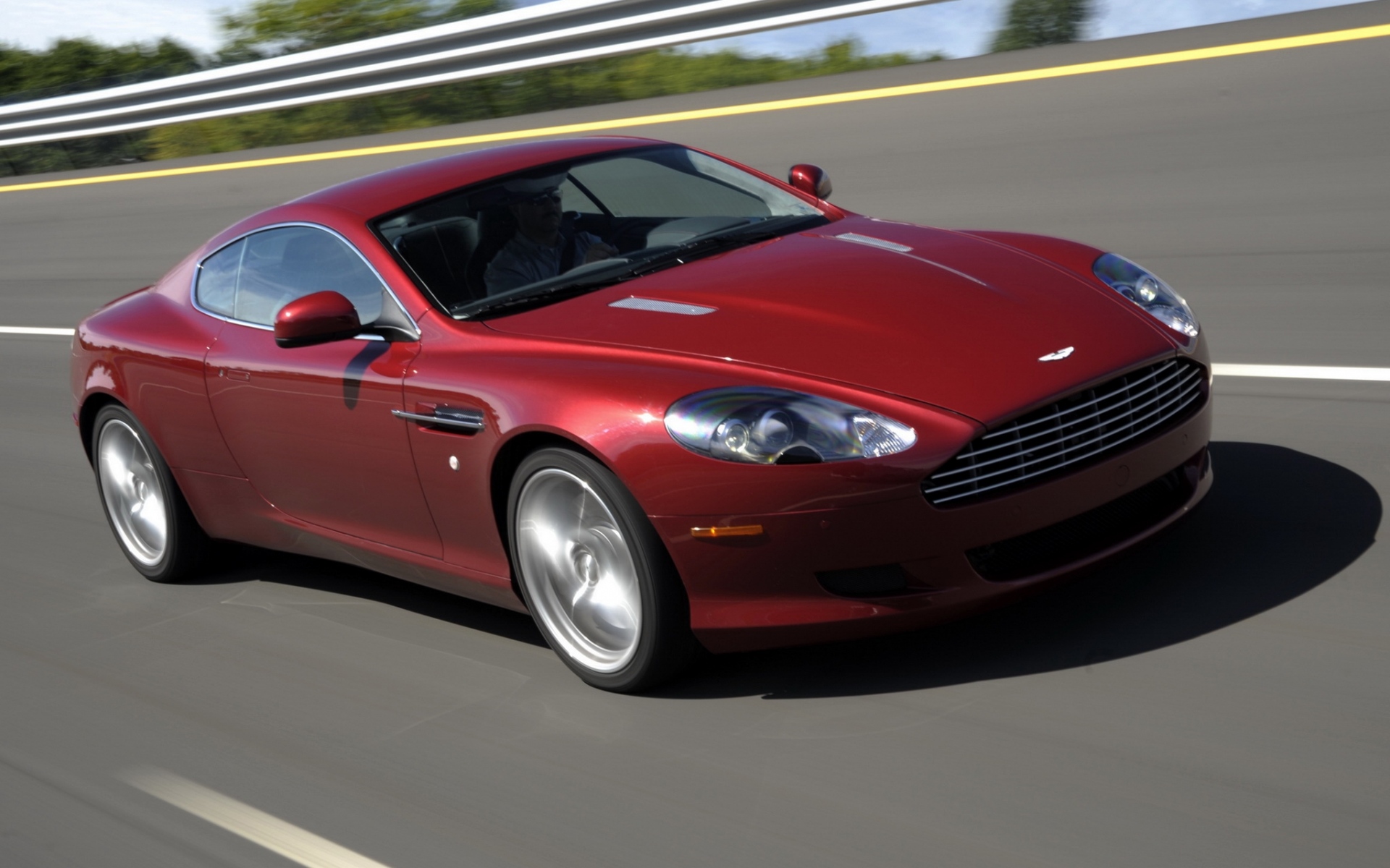 Картинки Aston martin, db9, 2008, красный, вид сбоку, стиль, автомобили, скорость, деревья, асфальт фото и обои на рабочий стол