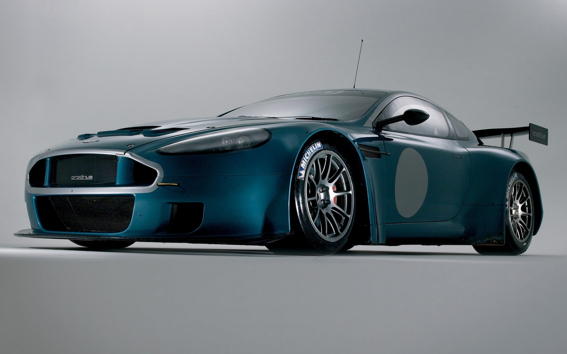 Картинки Aston martin, dbrs9, 2005, синий, вид спереди, стиль, автомобили фото и обои на рабочий стол