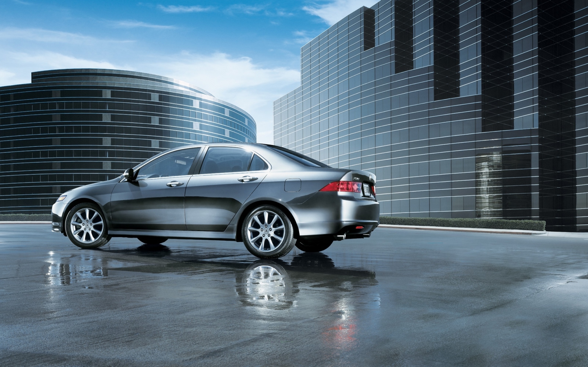 Картинки Acura, tsx, 2006, металлик серый, вид сбоку, стиль, автомобили, отражение, мокрый асфальт, здания, облака фото и обои на рабочий стол