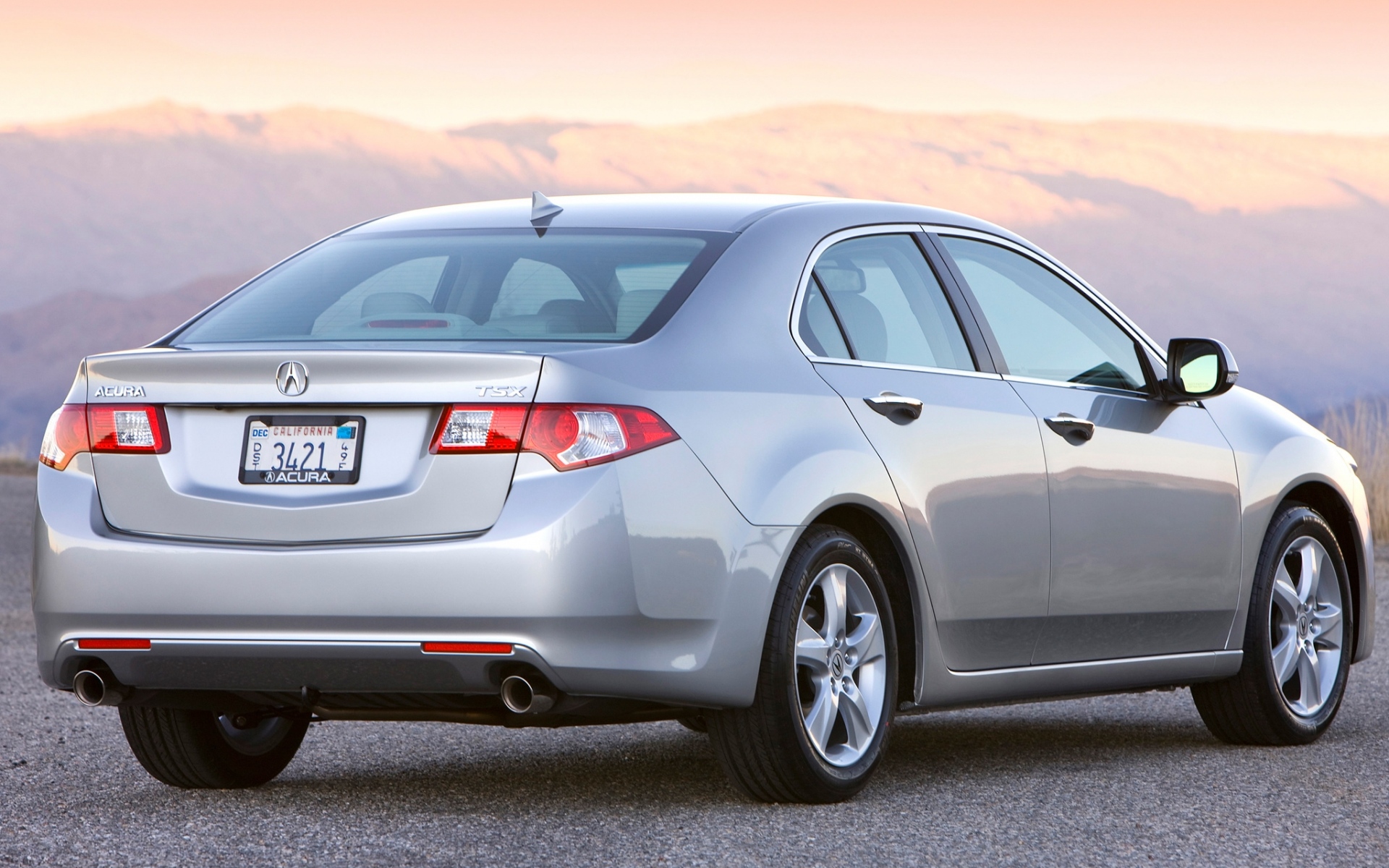 Картинки Acura, tsx, 2008, металлический серебристый, вид сзади, стиль, автомобили, горы, закат, асфальт фото и обои на рабочий стол